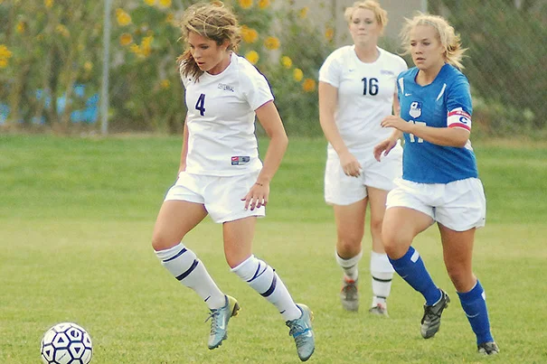 Women playing soccer